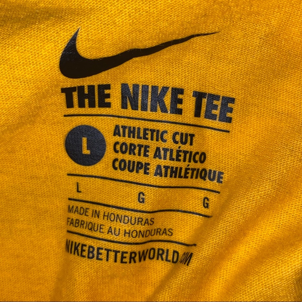 Nike gold shirt
